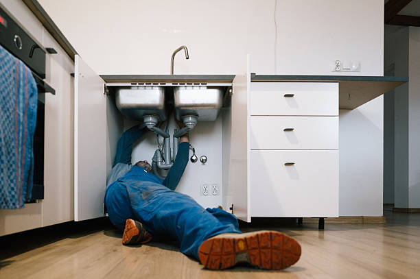 Professional Emergency Plumber technician working in Monmouth, OR